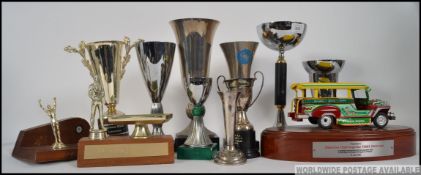 A good collection of various sized trophy's to include Pool amongst others please see images.