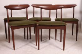 A good set of 4 1970's retro Danish teak propeller back dining chairs raised on turned legs with