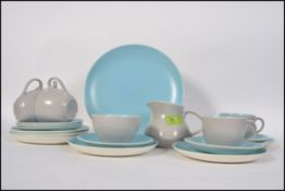 A lovely 20th century vintage / retro Poole Pottery tea service in the grey and blue colour way.