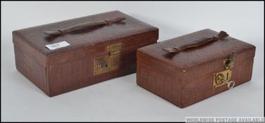 A near pair of vintage 20th century crocodile skin / leather jewellery boxes,