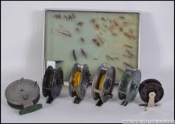 A collection of fly fishing reels to include examples by JW Young & Son, Roddy 31, Morrity's,