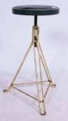 A vintage 20th century blue and white pipe edged machinists chair raised on white metal hairpin