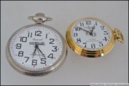 A 20th century Carvel open pocket watch having white metal case with Turksh crest and train emblem