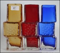 A group of three 20th century Whitefriars Geoffrey Baxter designed drunken bricklayers style vases