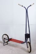 A vintage / retro childs scooter by Bantell, with original grips and working stand.
