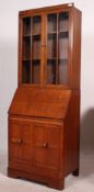 An early 20th century 1930's Ernest Gomme oak bureau bookcase,