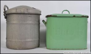 A Vintage mid 20th century enamel bread bin with notation to the front along with a vintage