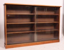 A good clean retro walnut library bookcase display cabinet having adjustable shelves,