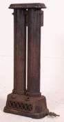 A Victorian cast Iron architectural heater radiator of double form raised on pedestal base.