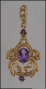 A hallmarked 9ct gold Art Nouveau pearl and amethyst drop necklace pendant .