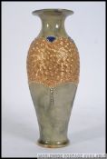 An early 20th century Doulton Lambeth stoneware glazed vase having blue rim with gilded finish
