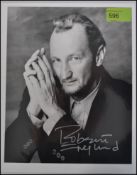 ROBERT ENGLUND; An original signed photograph from Freddie Krueger actor Robert England.