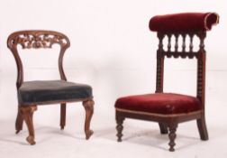 A Victorian mahogany upholstered nursing prie dieu chair with spindle gallery back rest and red