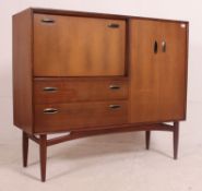 A rare Ernest Gomme - G-Plan sideboard having double door cupboard to the right ,