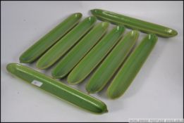A collection of 8 1970's ceramic vintage green glazed sweetcorn dishes - retro kitchenalia.