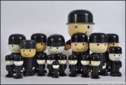 A collection of retro advertising Fred flour sifter and storage pots for McDougalls flour,