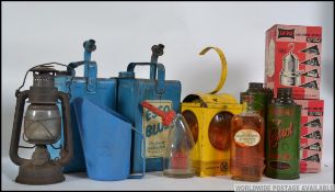 A good collection of vintage Automobilia to include Castrol oil bottles two Valor paraffin / oil