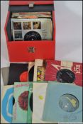 A collection f vinyl 45rpm record singles dating from the 1960's through to the 1990's,
