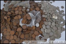 A large collection of vintage British coins dating from the turn of the 20th century,