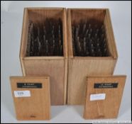 2 cased vintage bookbinders letter leather embossing stamps / tool punch press bits in the