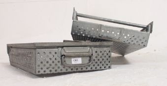 A pair of Industrial 20th century metal tote trays having pierced gallery sides.