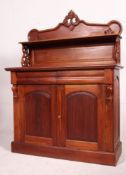A Victorian style mahogany Chiffonier sideboard being raised on plinth base with cupboard having