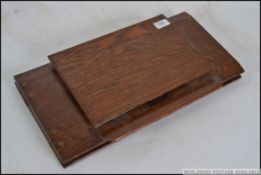 An early 20th Century collapsible oak lectern.