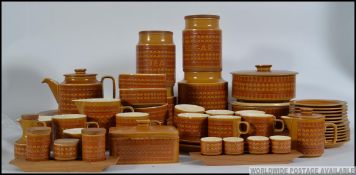 An extensive collection of Hornsea Saffron china from the 1970's to include dinner plates, cups,