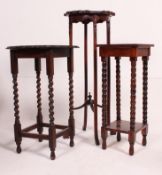 3 20th century plant stands to include a mahogany tall torchere and 2 oak barleytwist plant / side