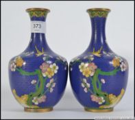 A pair of 20th century Chinese cloisonne enamel on brass vases,