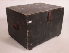 A Victorian ebonised pine military stemer trunk chest with hinged top having notation for RJ Mesney.