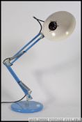 A retro anglepoise desk lamp in the manner of Herbert Terry with blue painted pendant shade and