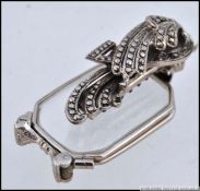 Retro vintage pair of lorgnette spectacles. Marcasite setting in white metal.