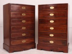 A stunning pair of mahogany large brass campaign inlaid bow front chests of drawers being of