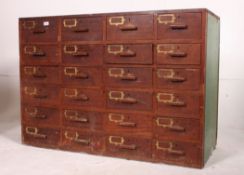 A stunning 20th century Industrial pine bank of twenty four drawers - chest of drawers.