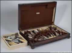 A vintage cased canteen of cutlery together with flatwares to include Walker & Hall etc.