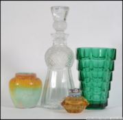 A retro / vintage studio green moulded glass vase, possibly Scandinavian,