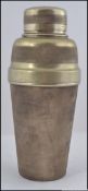 An early to mid 20th century machine turned silver plated four piece Cocktail shaker,