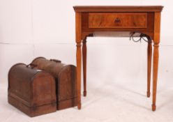 A 1930's walnut art deco sewing machine table with inset Singer sewing machine together with 2