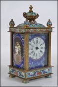 A 19th century French enamel champleve brass and gilded metal carriage clock.