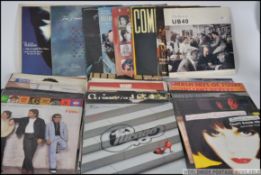 A collection of long play vinyl LP records dating to the 1980's to include UB40, Communards,