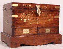 A stunning mahogany brass campaign inlaid chest box being of anglo-Indian origins and dating to