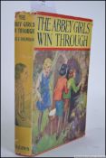 THE ABBEY GIRLS WIN THROUGH; OXENHAM, Elsie J. Published by Collins, 1st reprint, 1942.