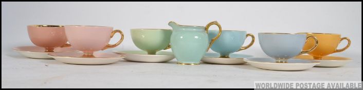 A set of 6 Norsk Egersund colourful cups and saucers from the mid 20th century together with a