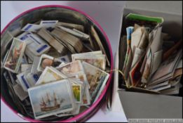 A large collection of cigarette cards to include John Player & Wills. Also Brook Bond cards.