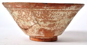 A believed Samanid slip painted pottery bowl from Eastern Persia, circa 10th century.