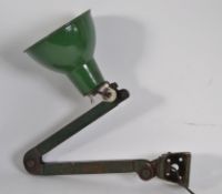 An excellent early Industrial heavy metal wall / block mount anglepoise lamp in original green
