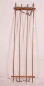 A vintage early 20th century pine rise and fall clothes airer pole system. Measures: 185cm x 54cm.