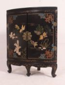 A Chinese black laquered soapstone corner unit.