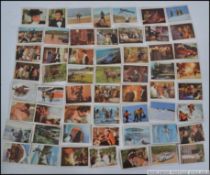 A full collection of 56 Anglo bubble gum trading cards for James Bond ' On Her Majestys Secret